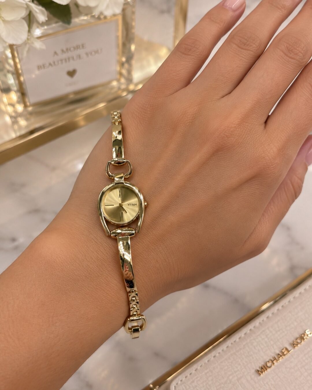 Gold Oval Link Watch